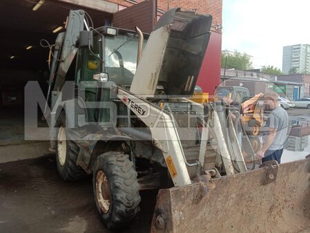 Ремонт экскаватора-погрузчика Terex 825 - 12